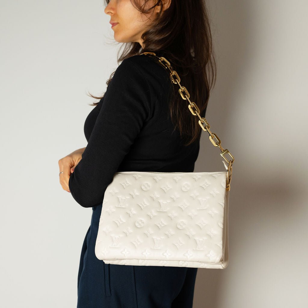 Second hand Louis Vuitton Coussin PM Leather Empreinte Messenger Crossbody Off - White - Tabita Bags