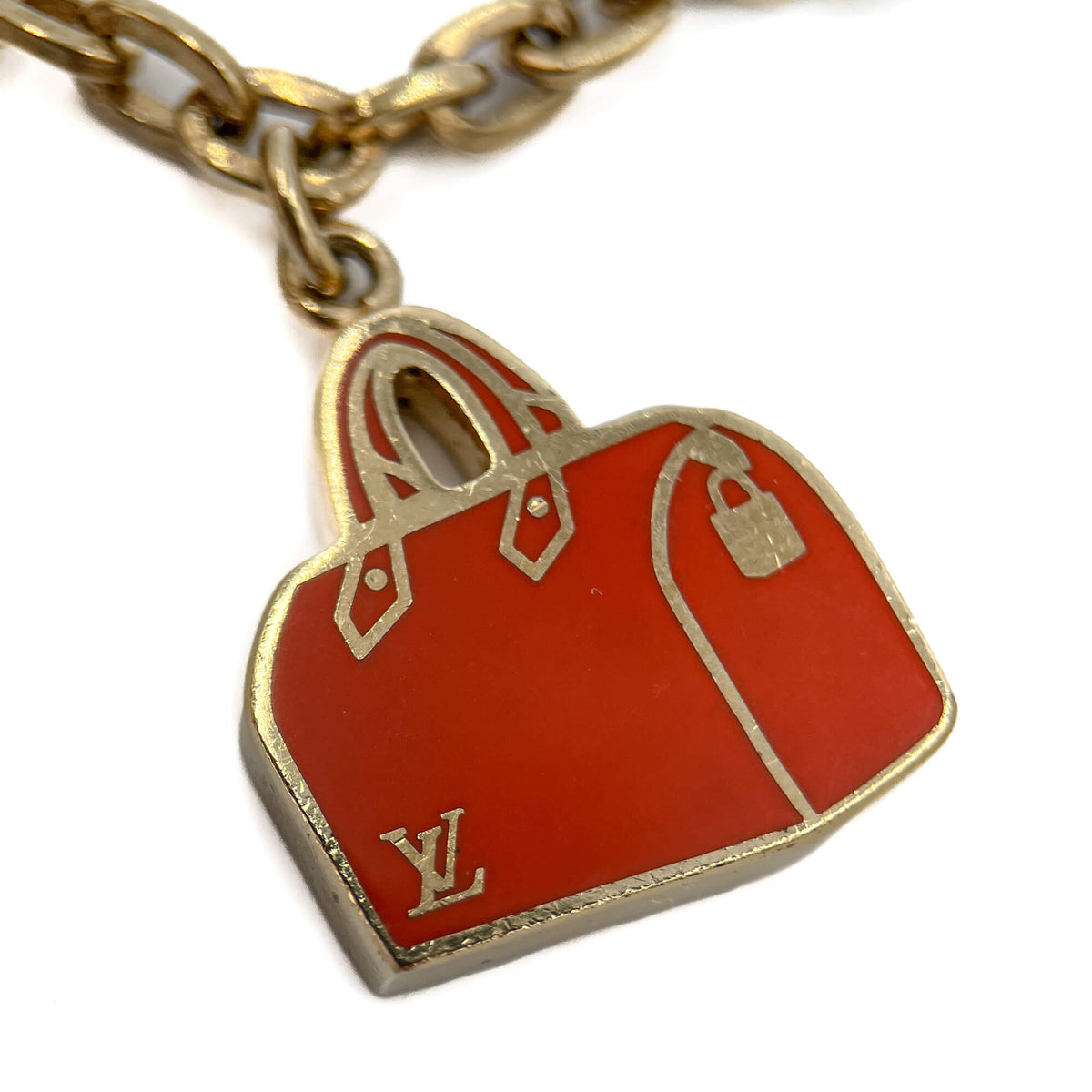 Second hand Louis Vuitton Emanel Iconic Speedy Brass Charm Multicolor - Tabita Bags