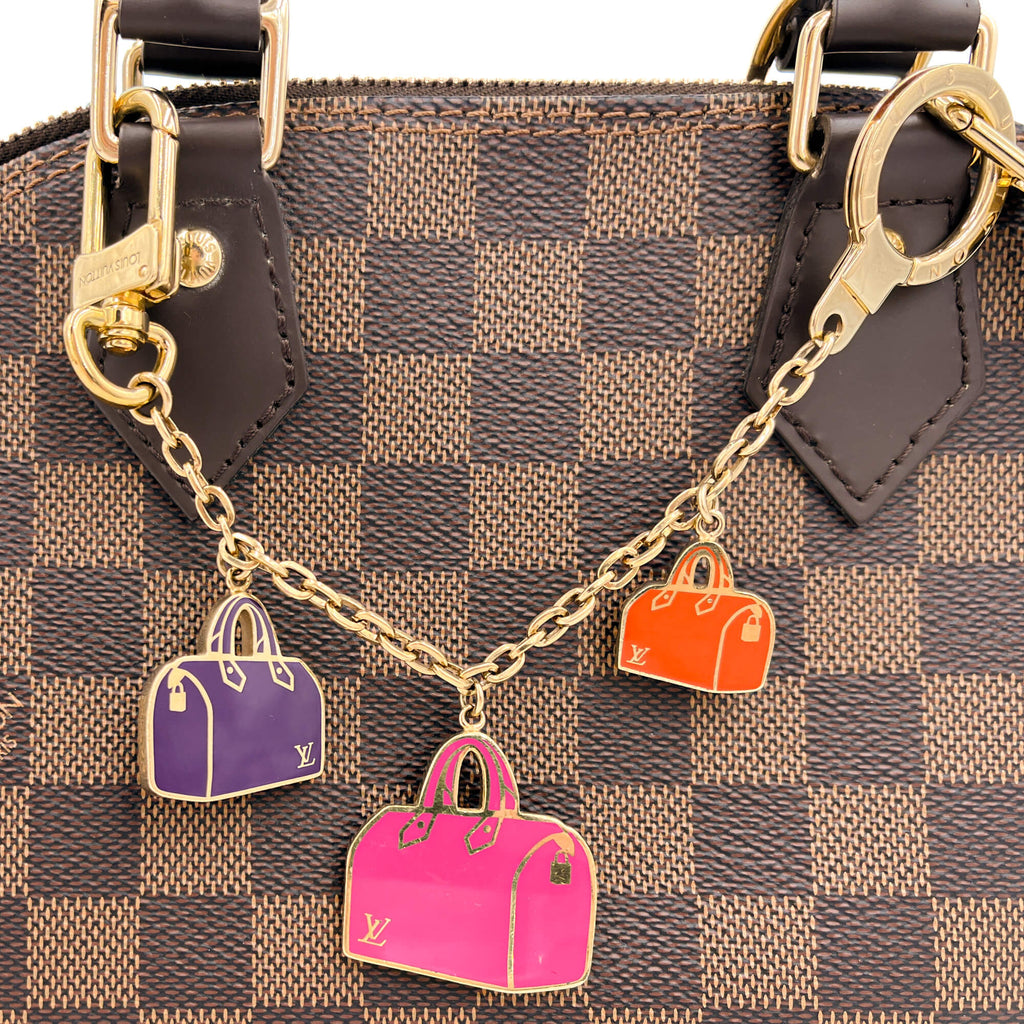 Second hand Louis Vuitton Emanel Iconic Speedy Brass Charm Multicolor - Tabita Bags
