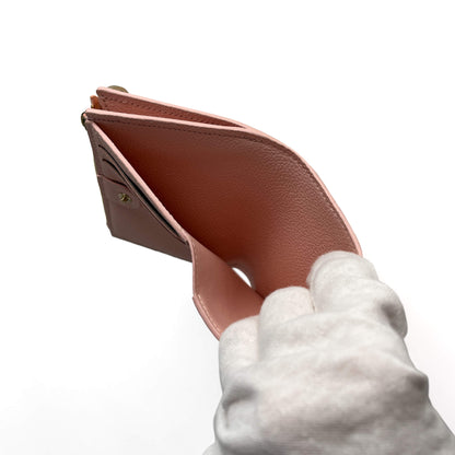 Second hand Louis Vuitton Lisa Calfskin Grained Leather Empreinte Folding Wallet Pink - Tabita Bags
