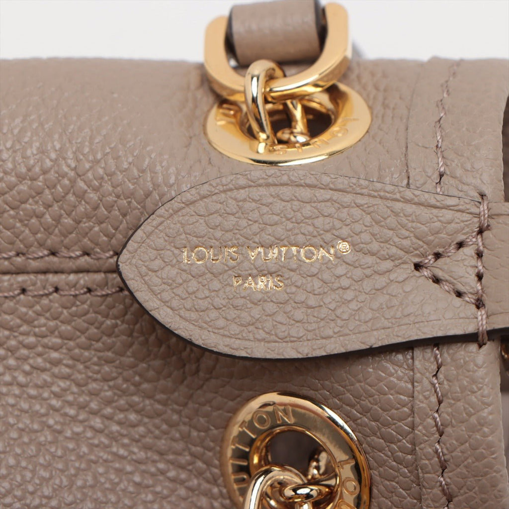 Second hand Louis Vuitton LV Bundle Leather Empreinte Shoulder Bag Handbag Beige - Tabita Bags