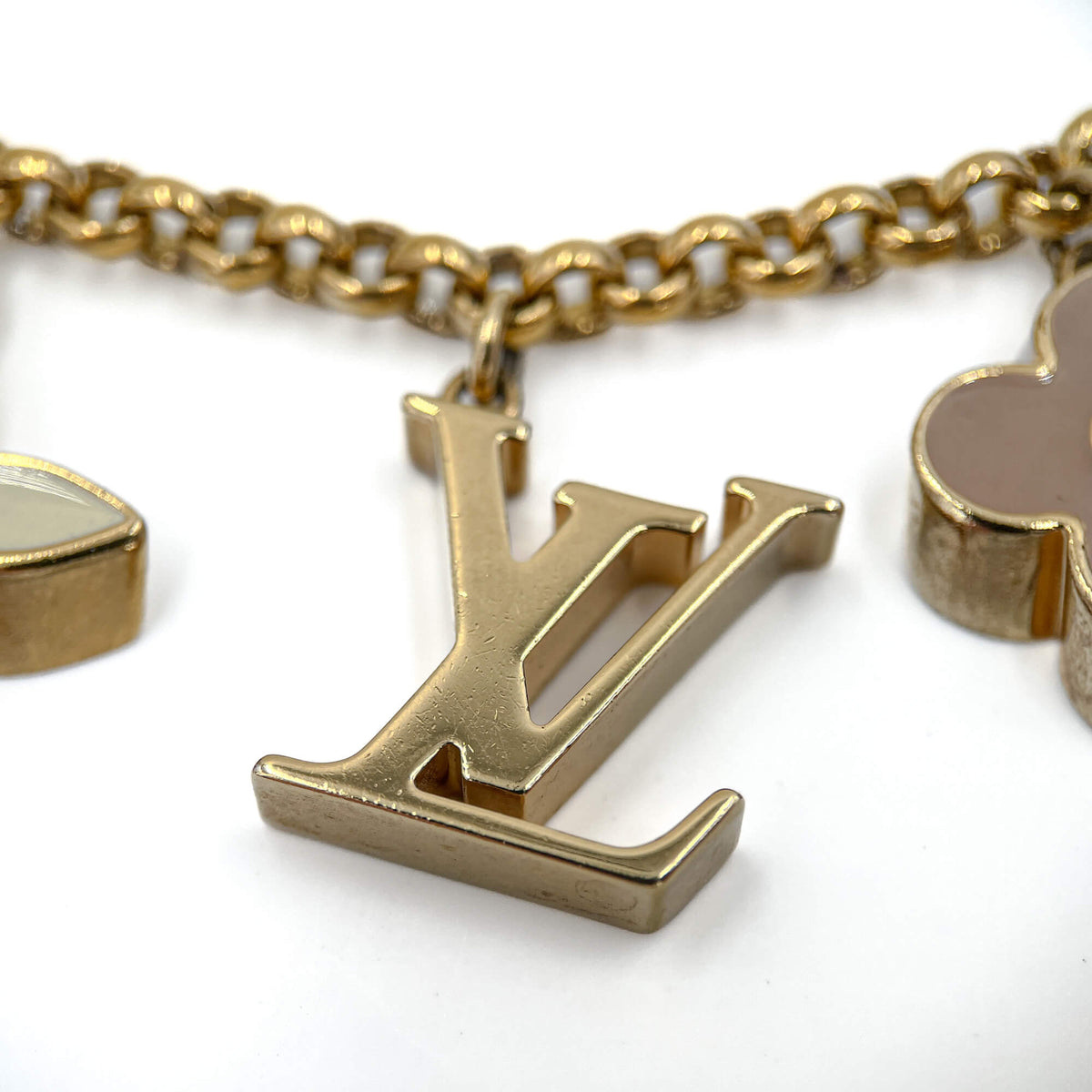 Second hand Louis Vuitton Monogram Flower Brass Charm Beige - Tabita Bags