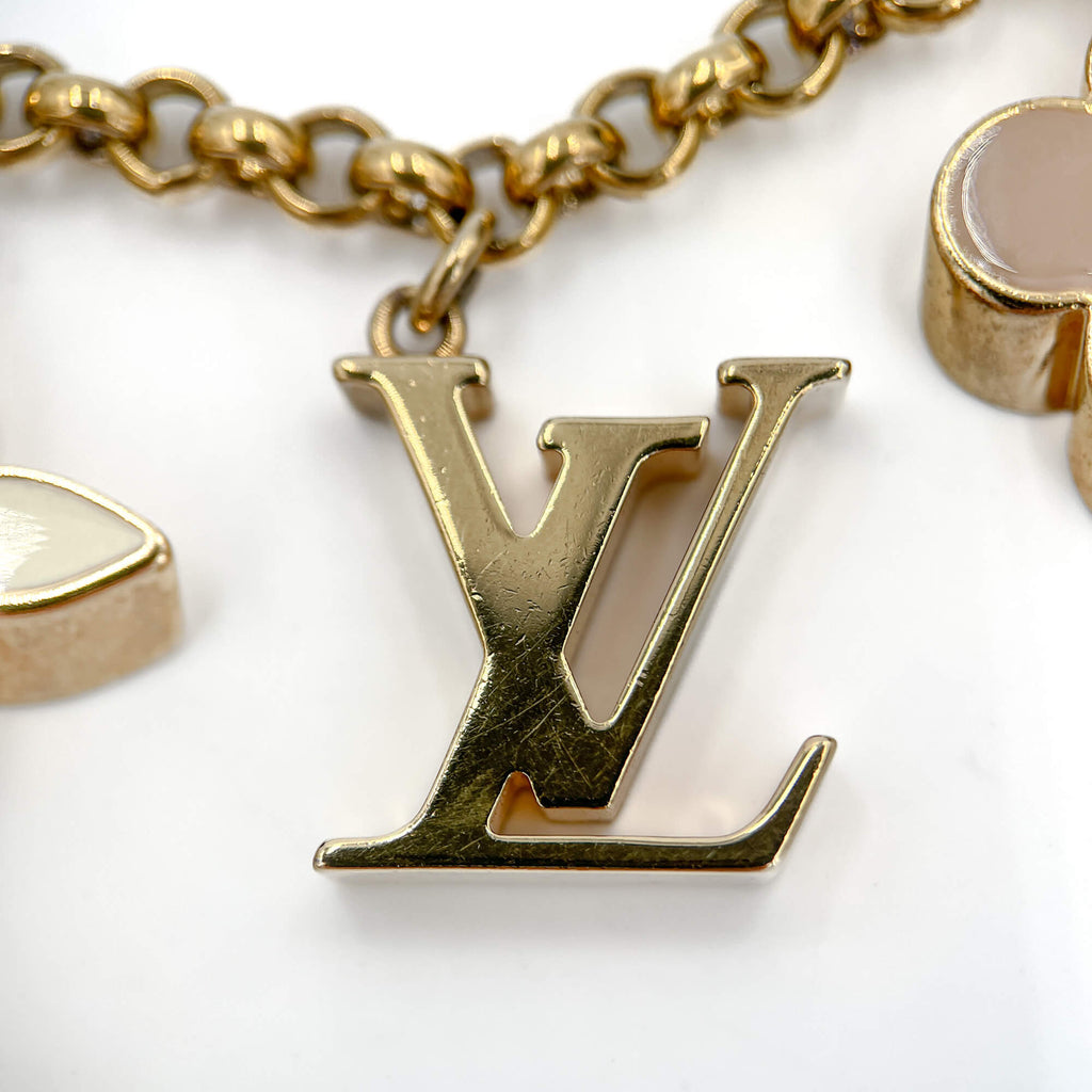 Second hand Louis Vuitton Monogram Flower Brass Charm Beige - Tabita Bags