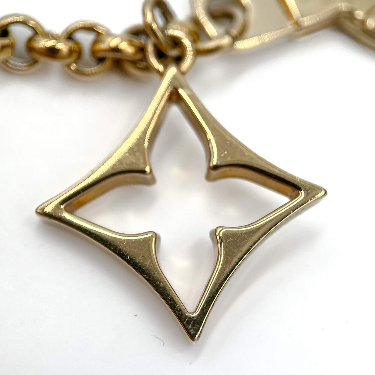 Second hand Louis Vuitton Monogram Flower Brass Charm Beige - Tabita Bags
