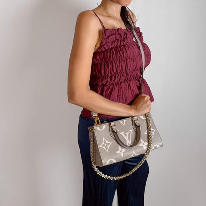 Second hand Louis Vuitton Onthego Leather East West Empreinte Tote Handbag Taupe - Tabita Bags