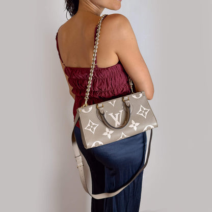 Second hand Louis Vuitton Onthego Leather East West Empreinte Tote Handbag Taupe - Tabita Bags