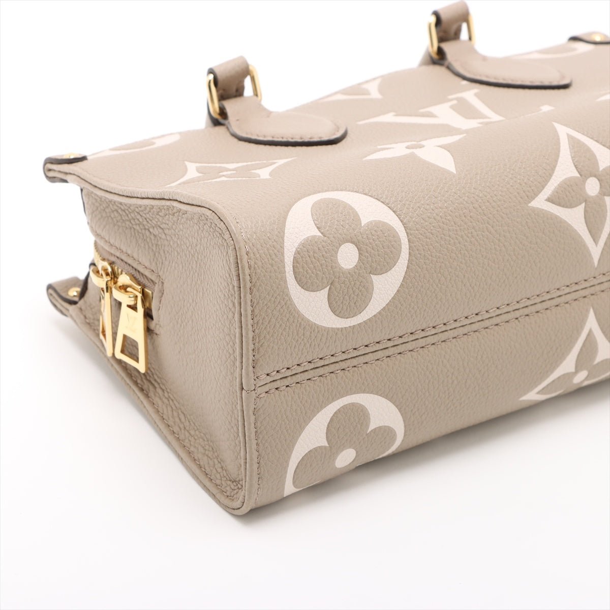 Second hand Louis Vuitton Onthego Leather East West Empreinte Tote Handbag Taupe - Tabita Bags