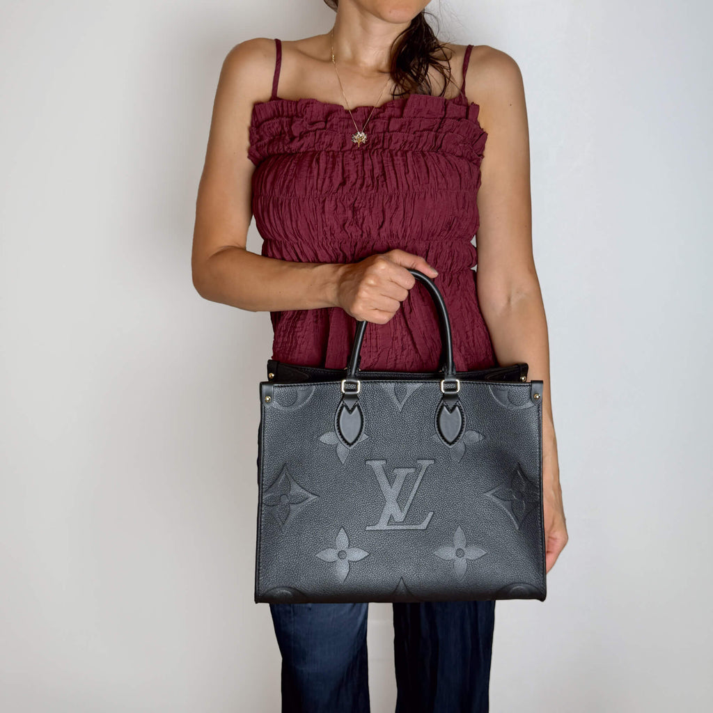 Second hand Louis Vuitton Onthego MM Calfskin Grained Leather Empreinte Tote Shoulder Bag Giant monogram - Tabita Bags