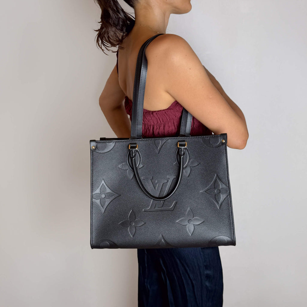 Second hand Louis Vuitton Onthego MM Calfskin Grained Leather Empreinte Tote Shoulder Bag Giant monogram - Tabita Bags