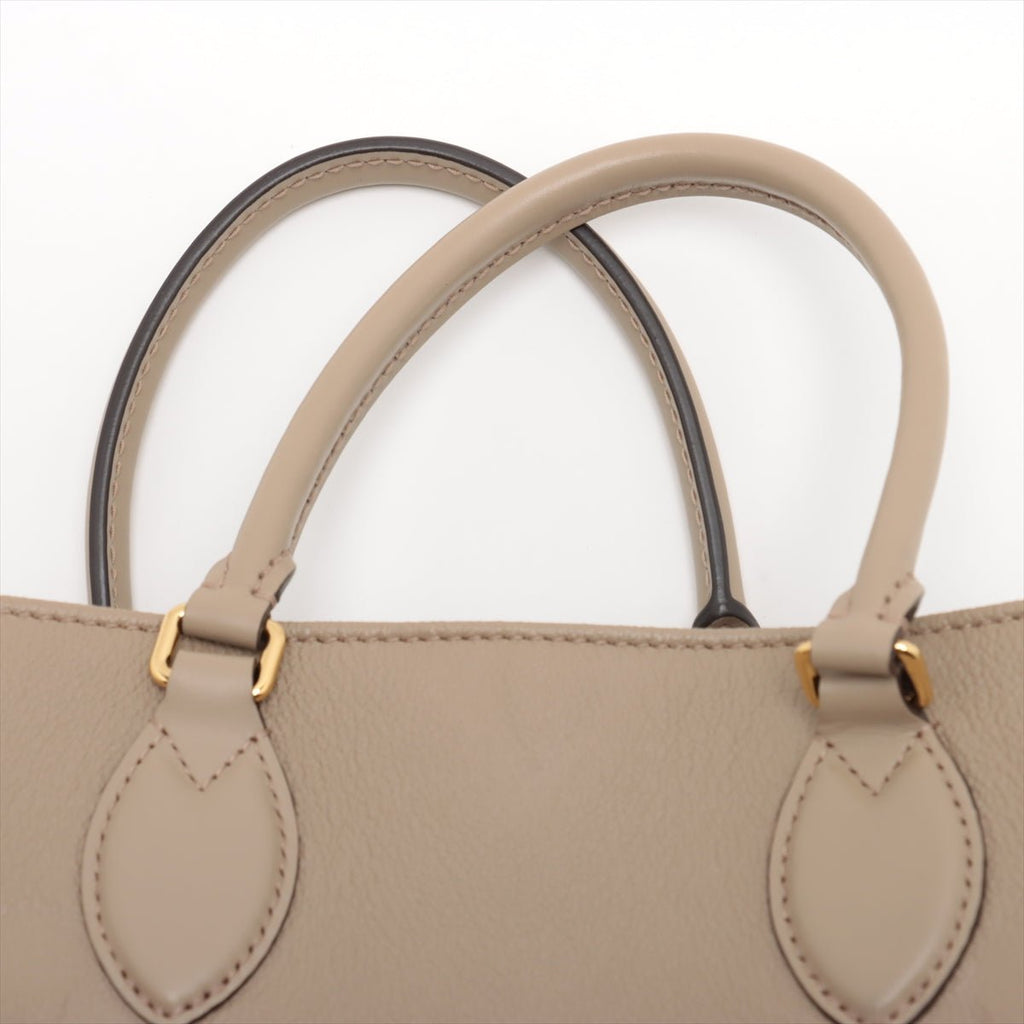 Second hand Louis Vuitton Onthego MM Empreinte Calfskin Grained Leather Tote Shoulder Bag Beige - Tabita Bags