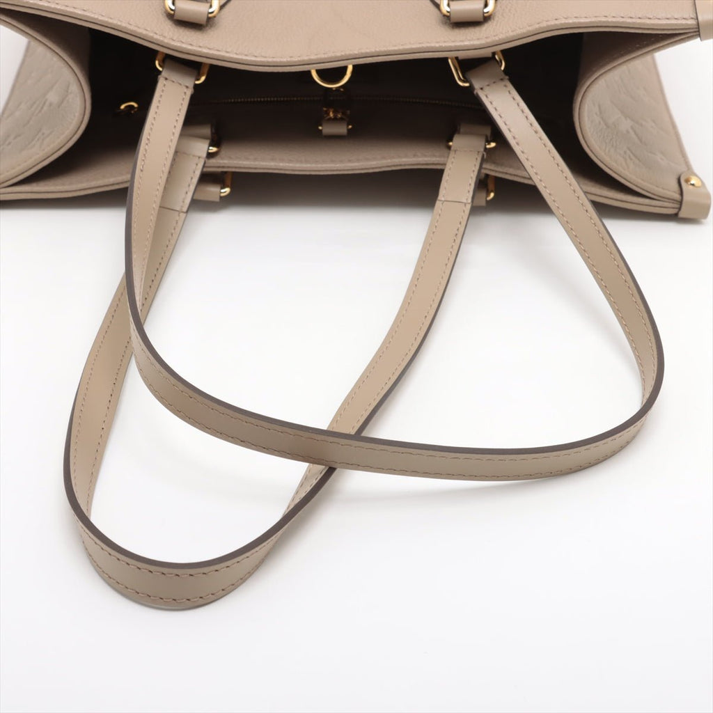 Second hand Louis Vuitton Onthego MM Empreinte Calfskin Grained Leather Tote Shoulder Bag Beige - Tabita Bags