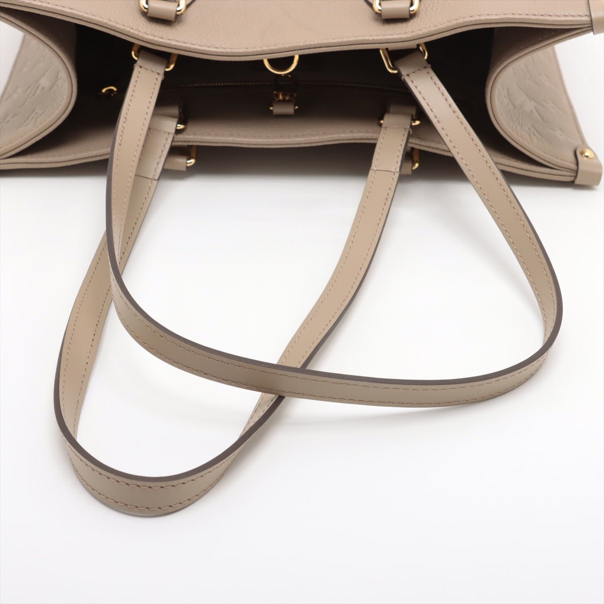 Second hand Louis Vuitton Onthego MM Empreinte Calfskin Grained Leather Tote Shoulder Bag Beige - Tabita Bags