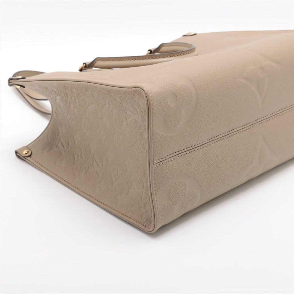 Second hand Louis Vuitton Onthego MM Empreinte Calfskin Grained Leather Tote Shoulder Bag Beige - Tabita Bags