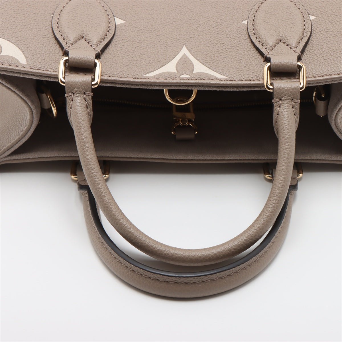 Second hand Louis Vuitton Onthego PM Calfskin Grained Leather Empreinte Tote Shoulder Bag Giant Empreinte - Tabita Bags