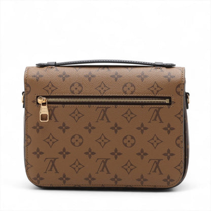 Second hand Louis Vuitton Pochette Metis Canvas Monogram Reverse Flap Crossbody Monogram Reverse - Tabita Bags