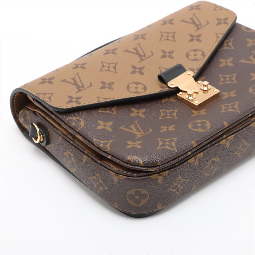 Second hand Louis Vuitton Pochette Metis Canvas Monogram Reverse Flap Crossbody Monogram Reverse - Tabita Bags