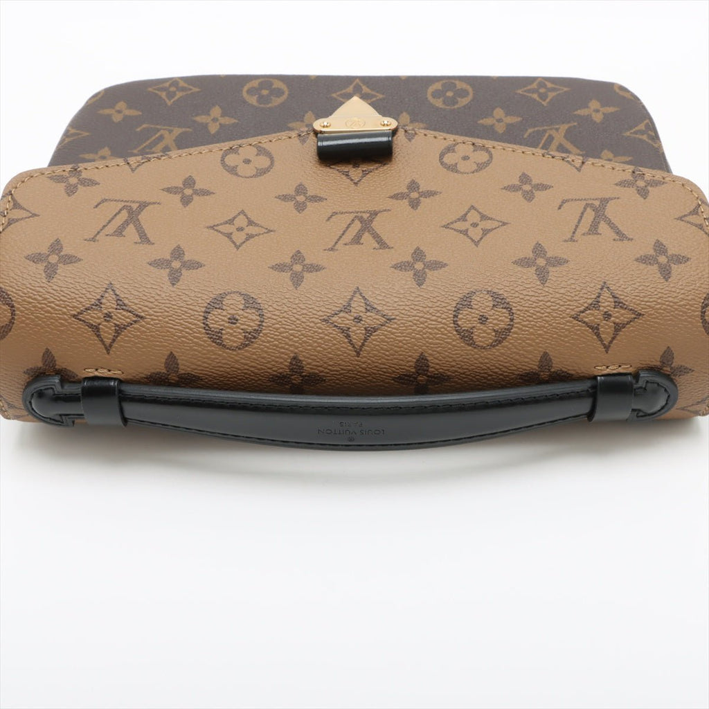 Second hand Louis Vuitton Pochette Metis Canvas Monogram Reverse Flap Crossbody Monogram Reverse - Tabita Bags