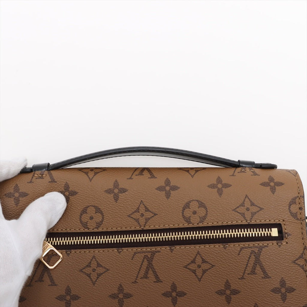 Second hand Louis Vuitton Pochette Metis Canvas Monogram Reverse Flap Crossbody Monogram Reverse - Tabita Bags