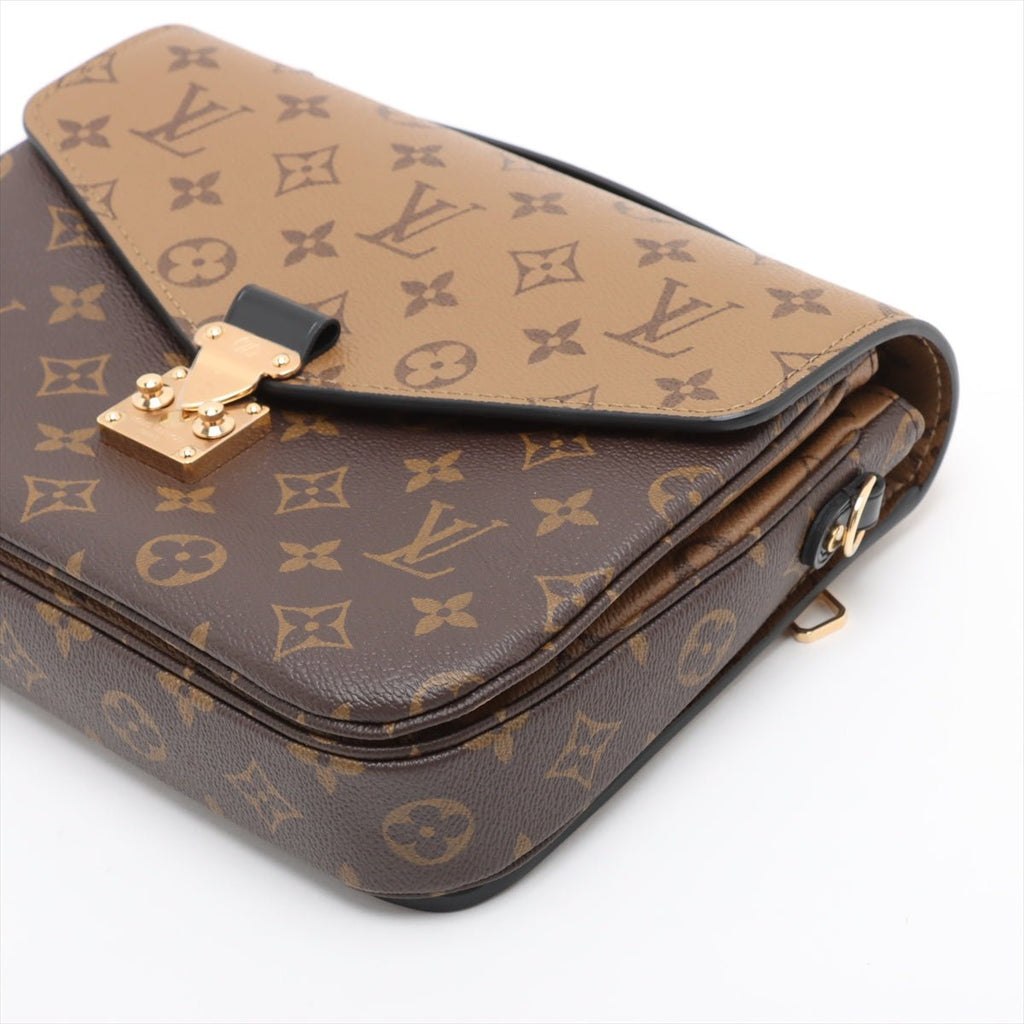 Second hand Louis Vuitton Pochette Metis Canvas Monogram Reverse Flap Crossbody Monogram Reverse - Tabita Bags