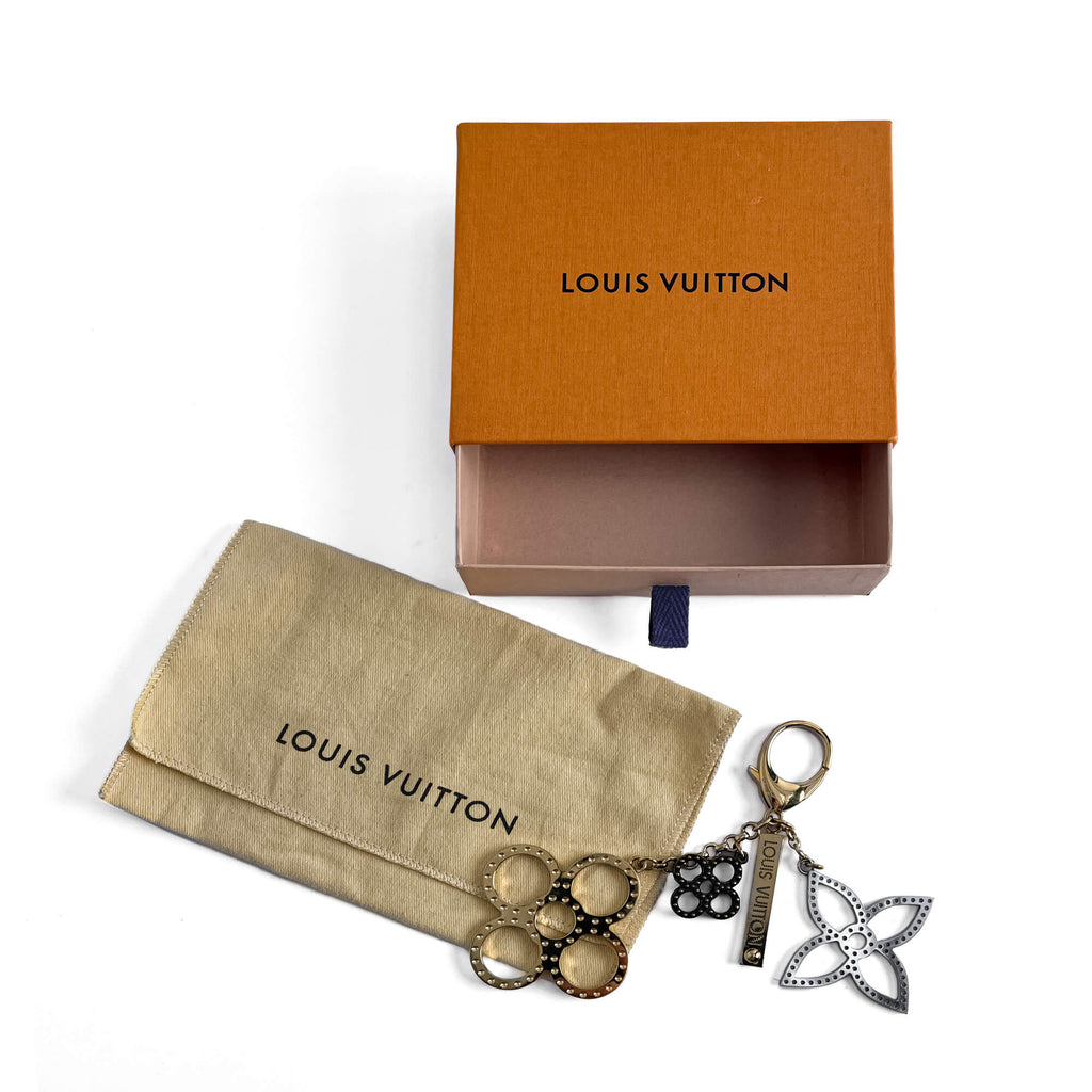 Second hand Louis Vuitton Tapage Charm - Tabita Bags