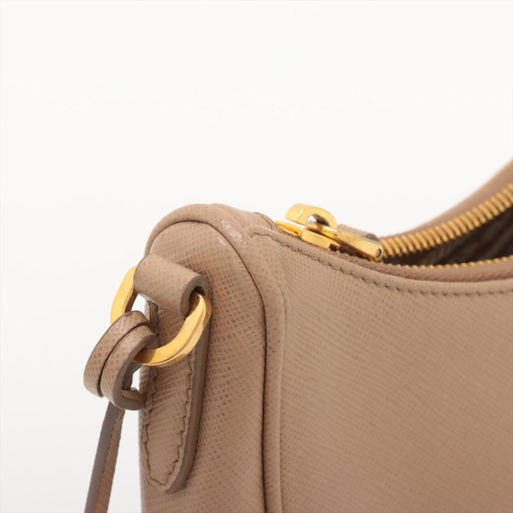 Second hand Prada Re - Edition 2005 Leather Pouch Crossbody Beige - Tabita Bags