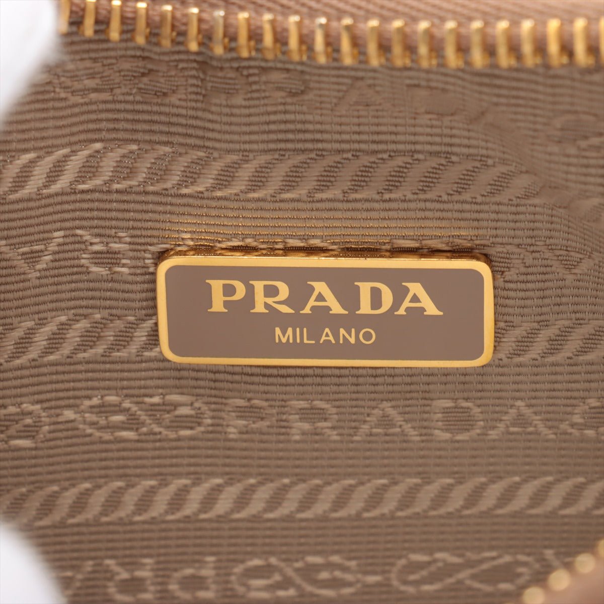 Second hand Prada Re - Edition 2005 Leather Pouch Crossbody Beige - Tabita Bags