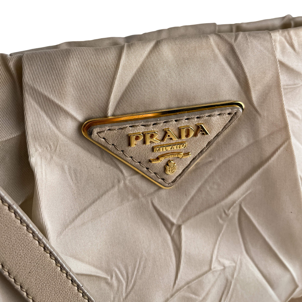Second hand Prada Re - Edition Econyl Nylon Satchel Crossbody Desert Beige - Tabita Bags