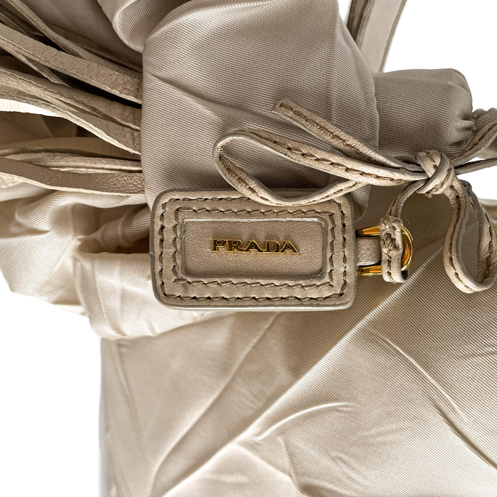 Second hand Prada Re - Edition Econyl Nylon Satchel Crossbody Desert Beige - Tabita Bags