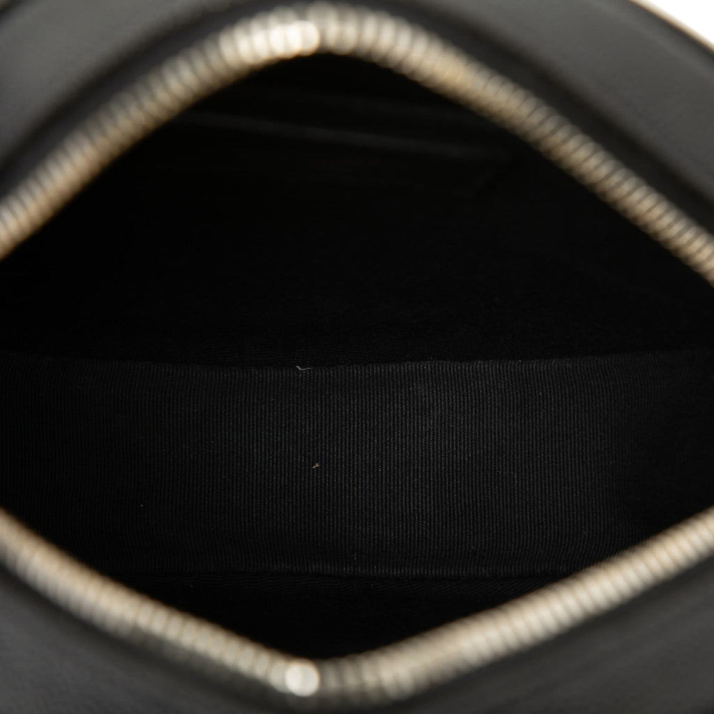 Second hand Saint Laurent Vinyle Grained Calfskin Leather Round Chevron Quilted Camera Crossbody Black - Tabita Bags