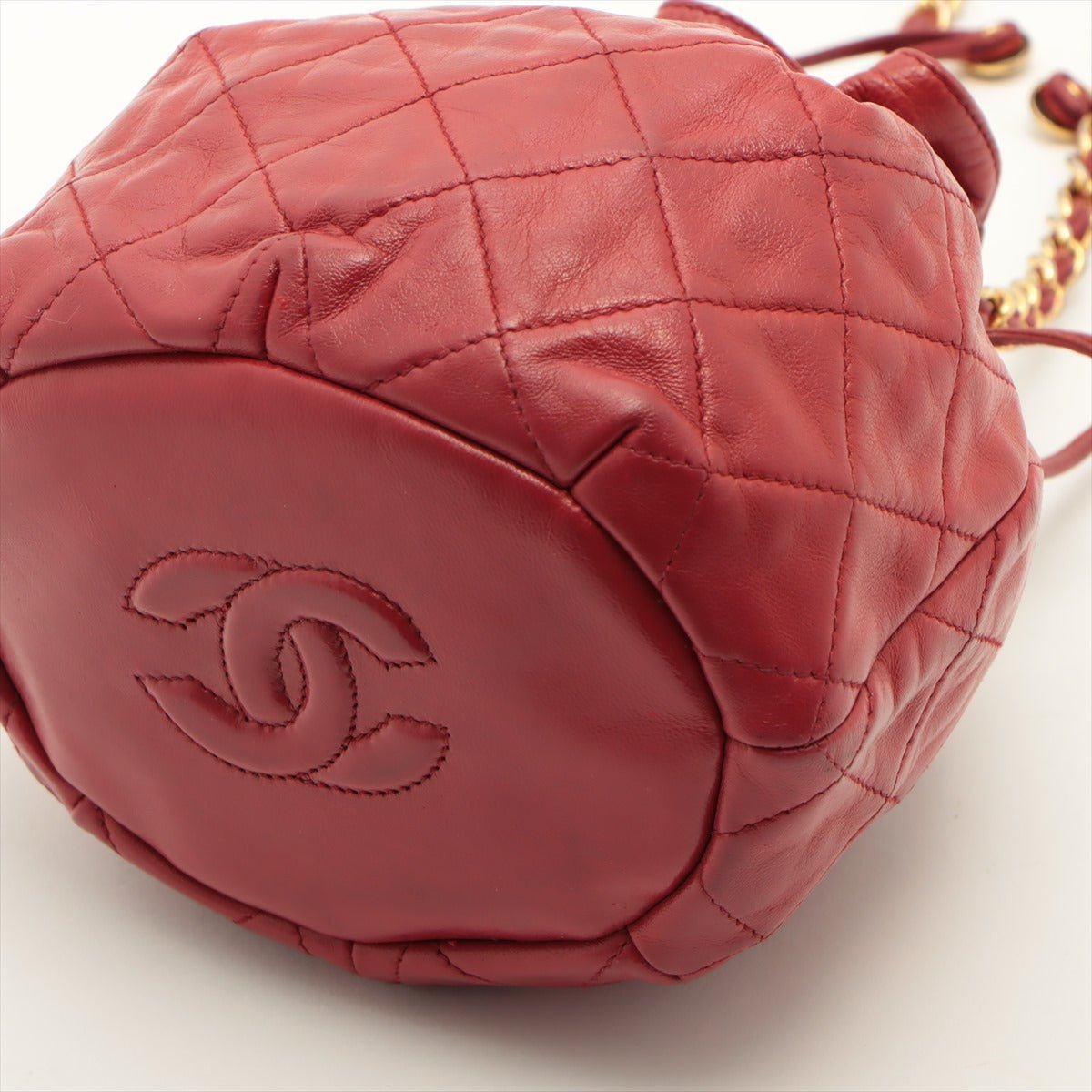 Second hand Chanel Mini Drawstring Bucket 1986-1988 Red Quilted Lambskin Gold - Tabita Bags