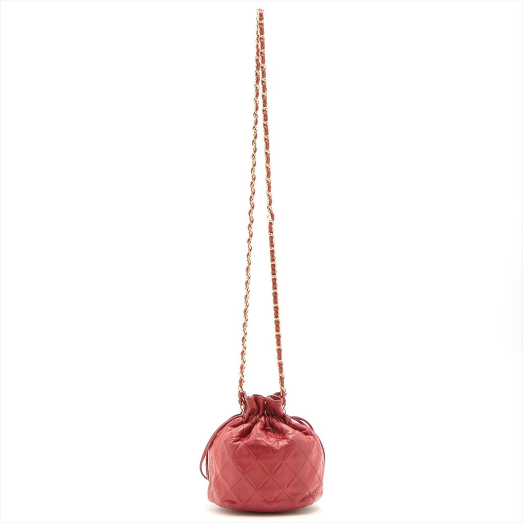 Second hand Chanel Mini Drawstring Bucket 1986-1988 Red Quilted Lambskin Gold - Tabita Bags