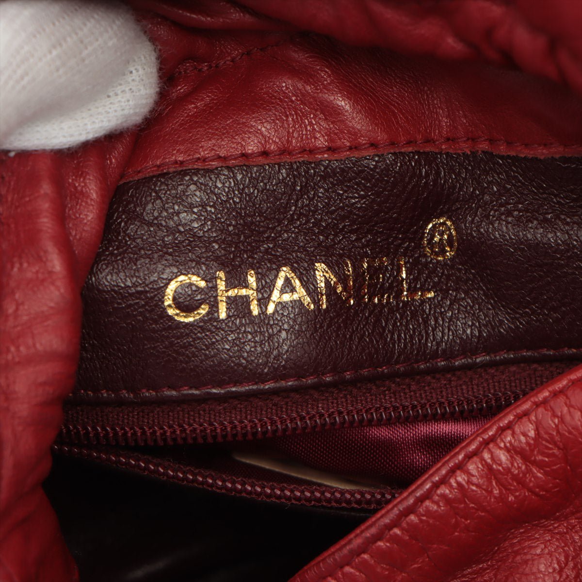 Second hand Chanel Mini Drawstring Bucket 1986-1988 Red Quilted Lambskin Gold - Tabita Bags