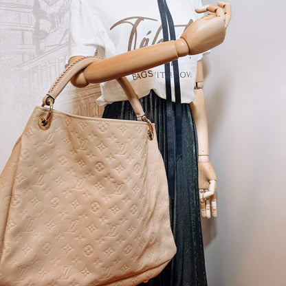 Second hand Louis Vuitton Artsy MM Monogram Empreinte Leather Beige Hobo - Tabita Bags