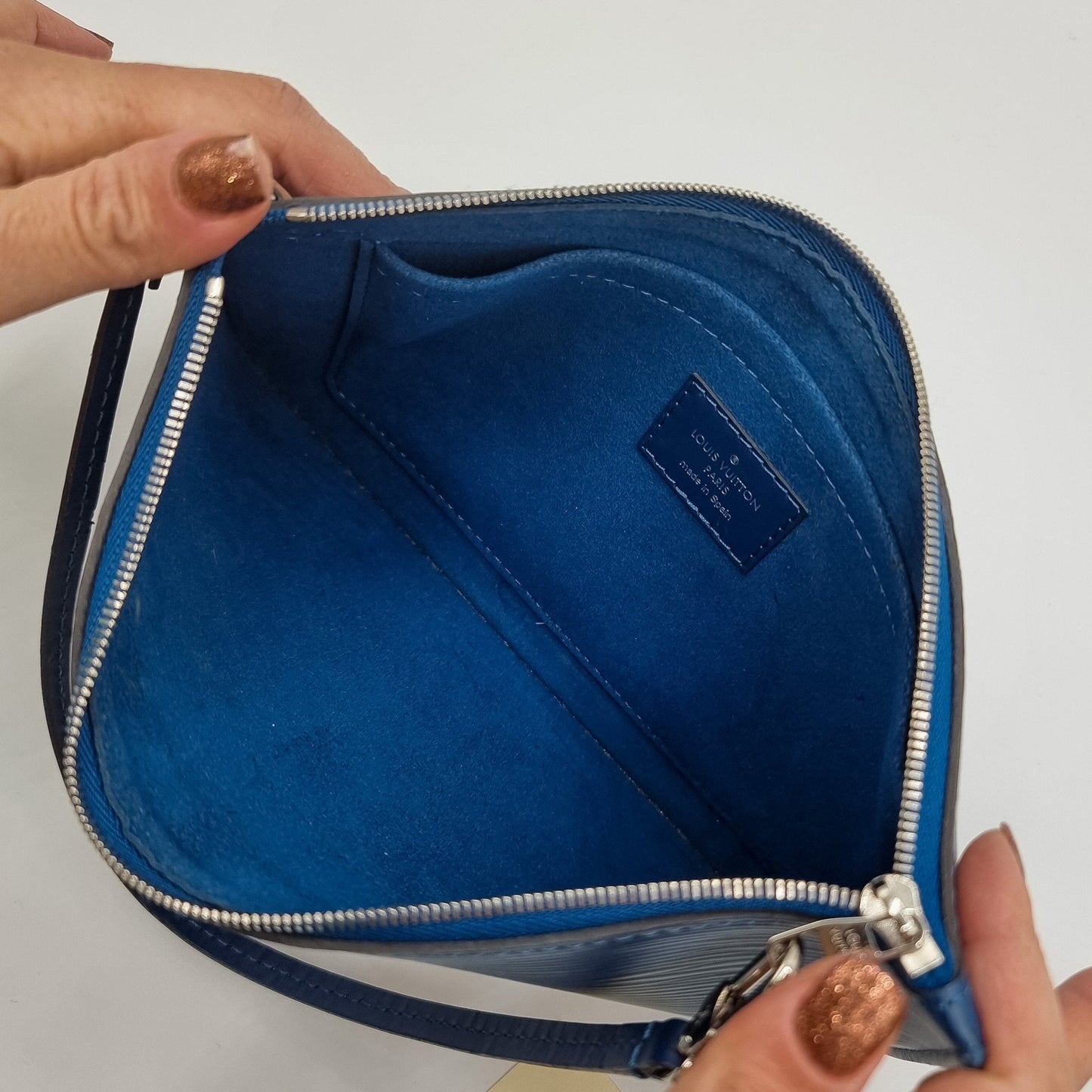 Second hand Louis Vuitton Blue Epi Leather Wristlet Pouch - Tabita Bags