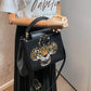 Second hand Louis Vuitton Capucines BB 2way Taurillon Leather Trapped Leopard Black - Tabita Bags