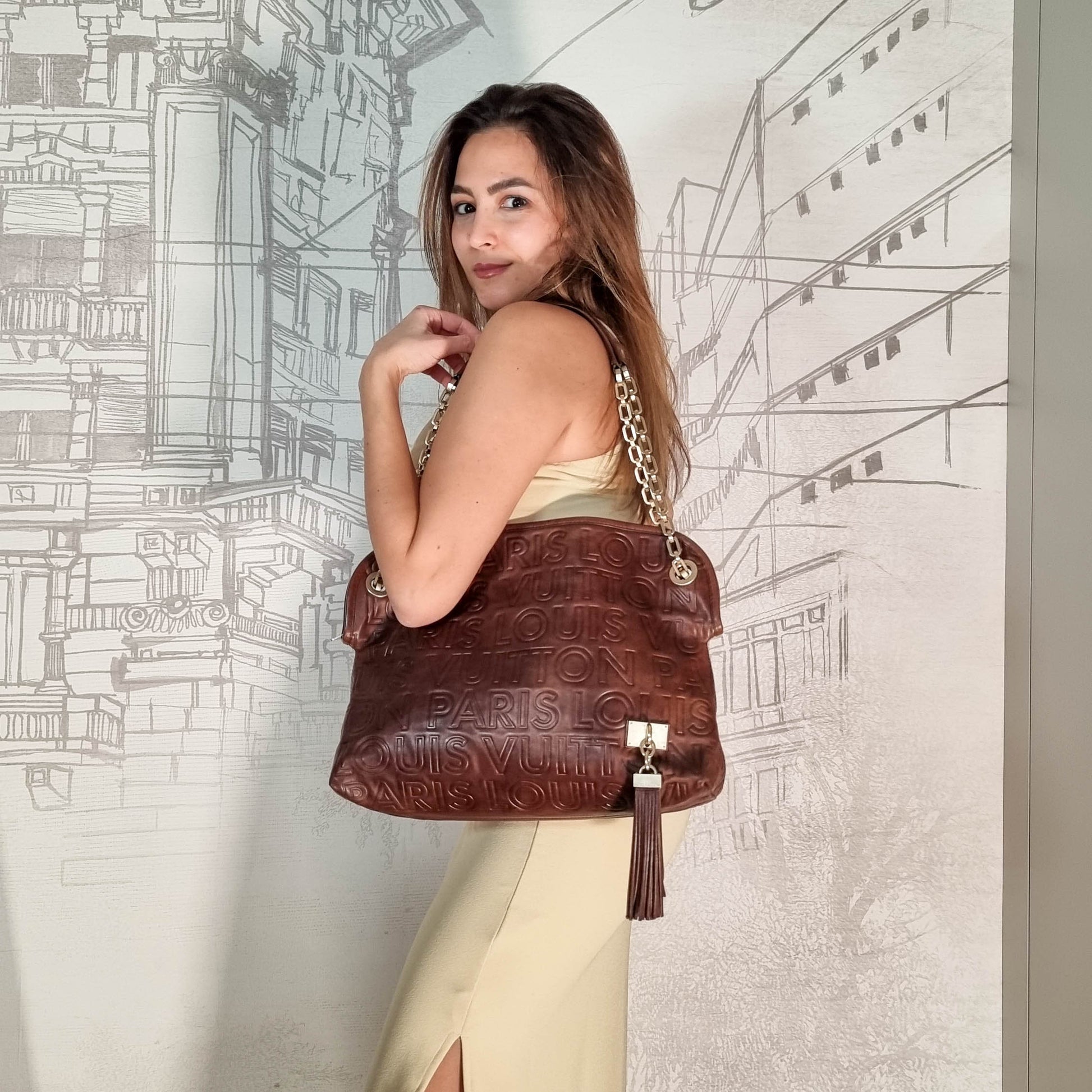 Whisper leather handbag Louis Vuitton Brown in Leather - 30819563