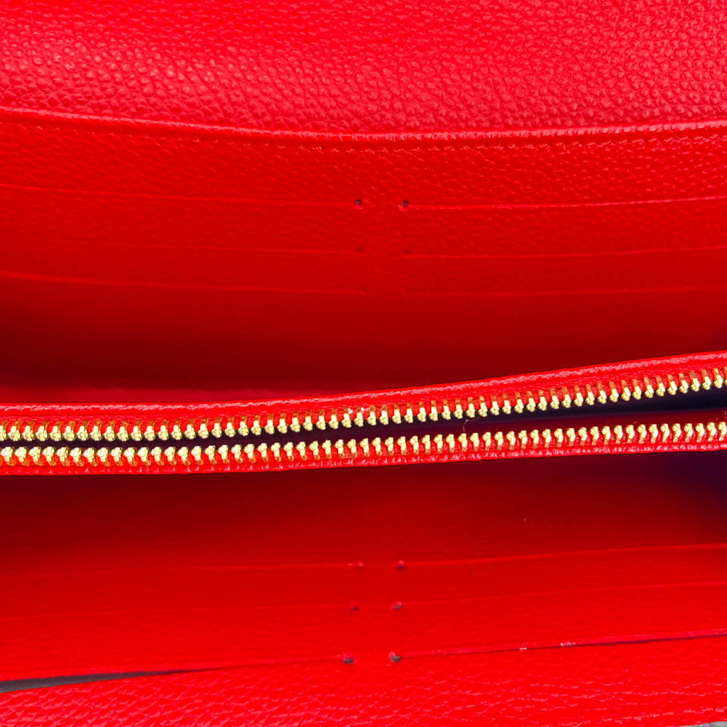 Second hand Louis Vuitton Sarah Empreinte Leather Red Wallet - Tabita Bags