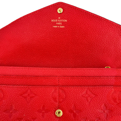 Second hand Louis Vuitton Sarah Empreinte Leather Red Wallet - Tabita Bags