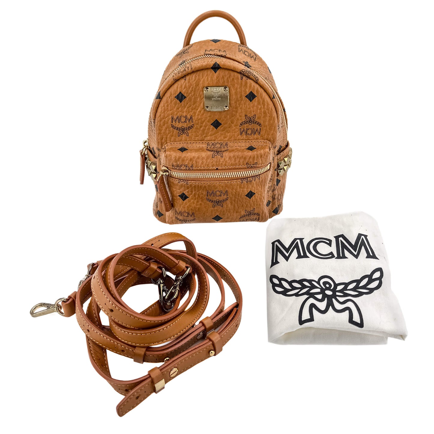 Second hand MCM X-Mini Stark Bebe Boo Side Studs Leather Backpack Cognac - Tabita Bags