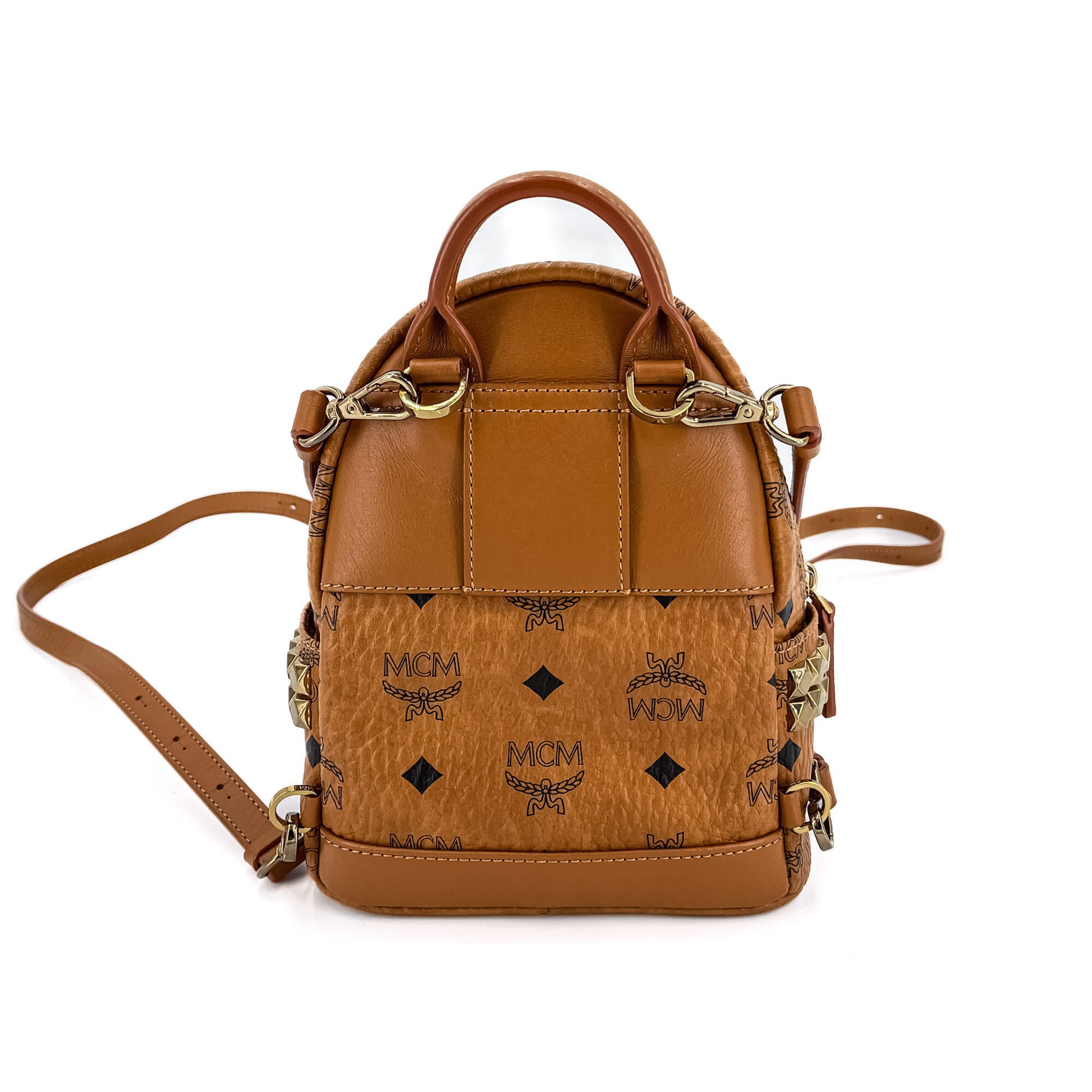 Second hand MCM X-Mini Stark Bebe Boo Side Studs Leather Backpack Cognac - Tabita Bags