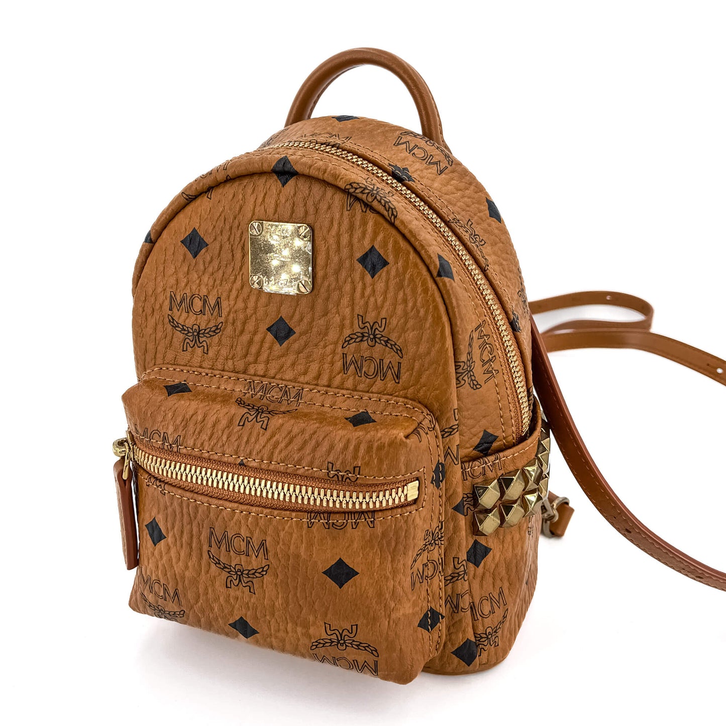 Second hand MCM X-Mini Stark Bebe Boo Side Studs Leather Backpack Cognac - Tabita Bags