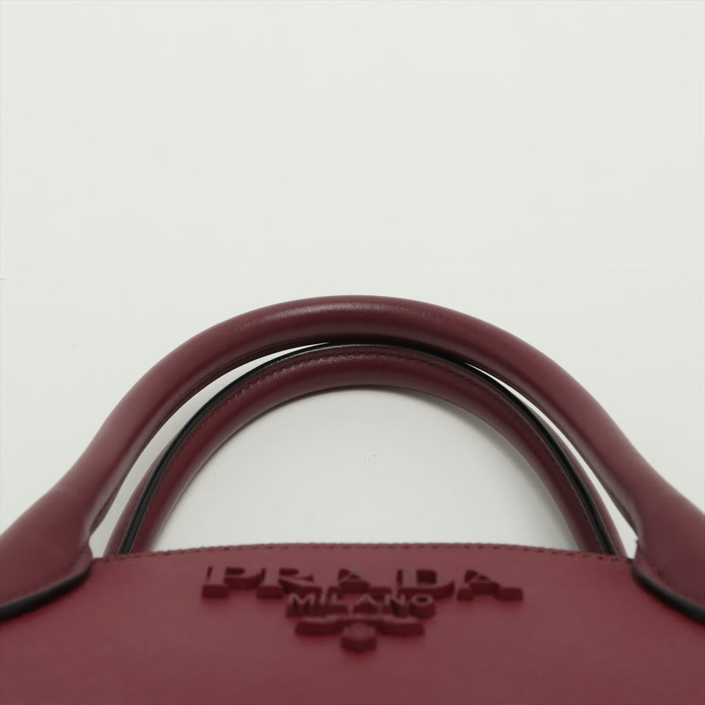Second hand Prada Monochrome Small Saffiano Leather Burgundy Bag - Tabita Bags