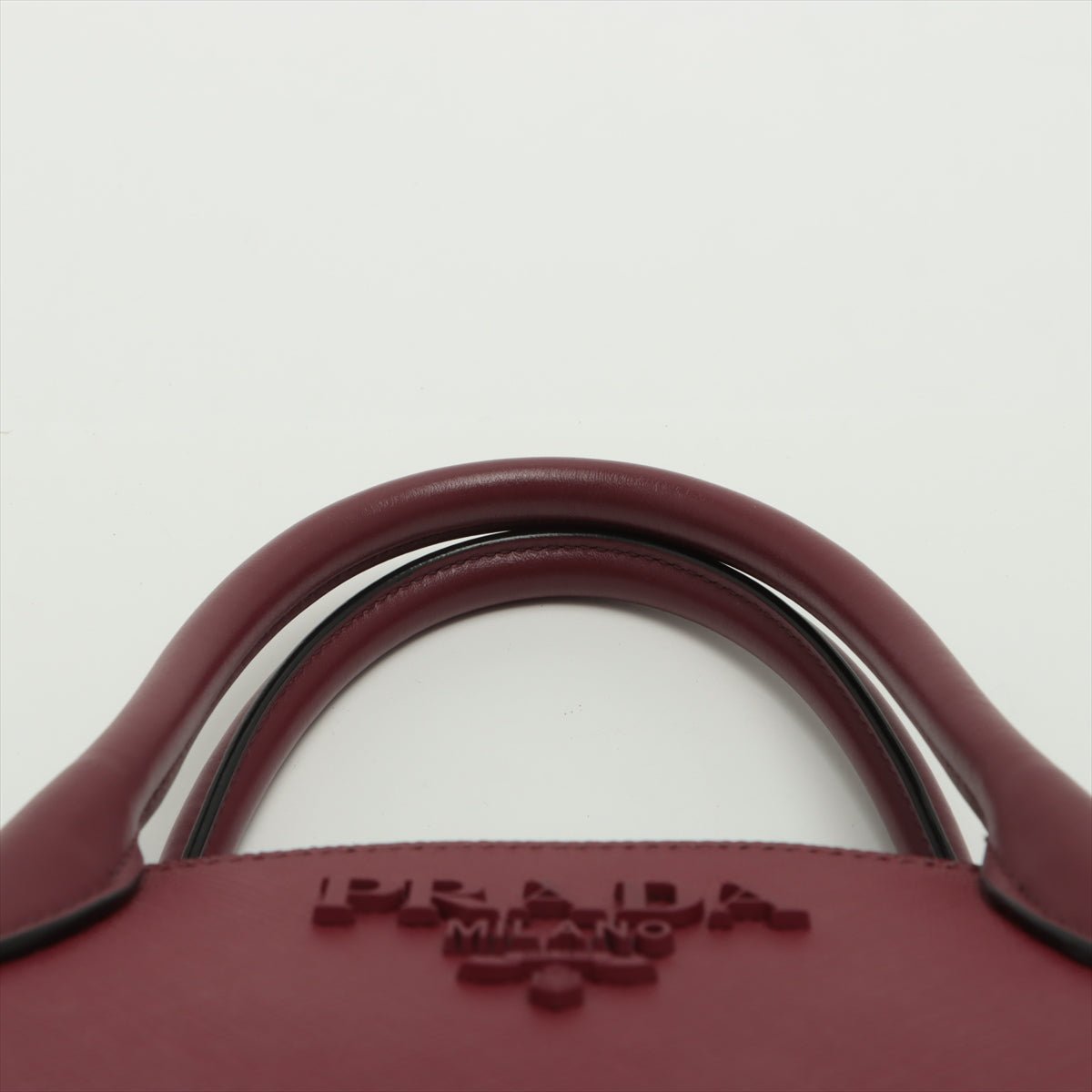 Second hand Prada Monochrome Small Saffiano Leather Burgundy Bag - Tabita Bags