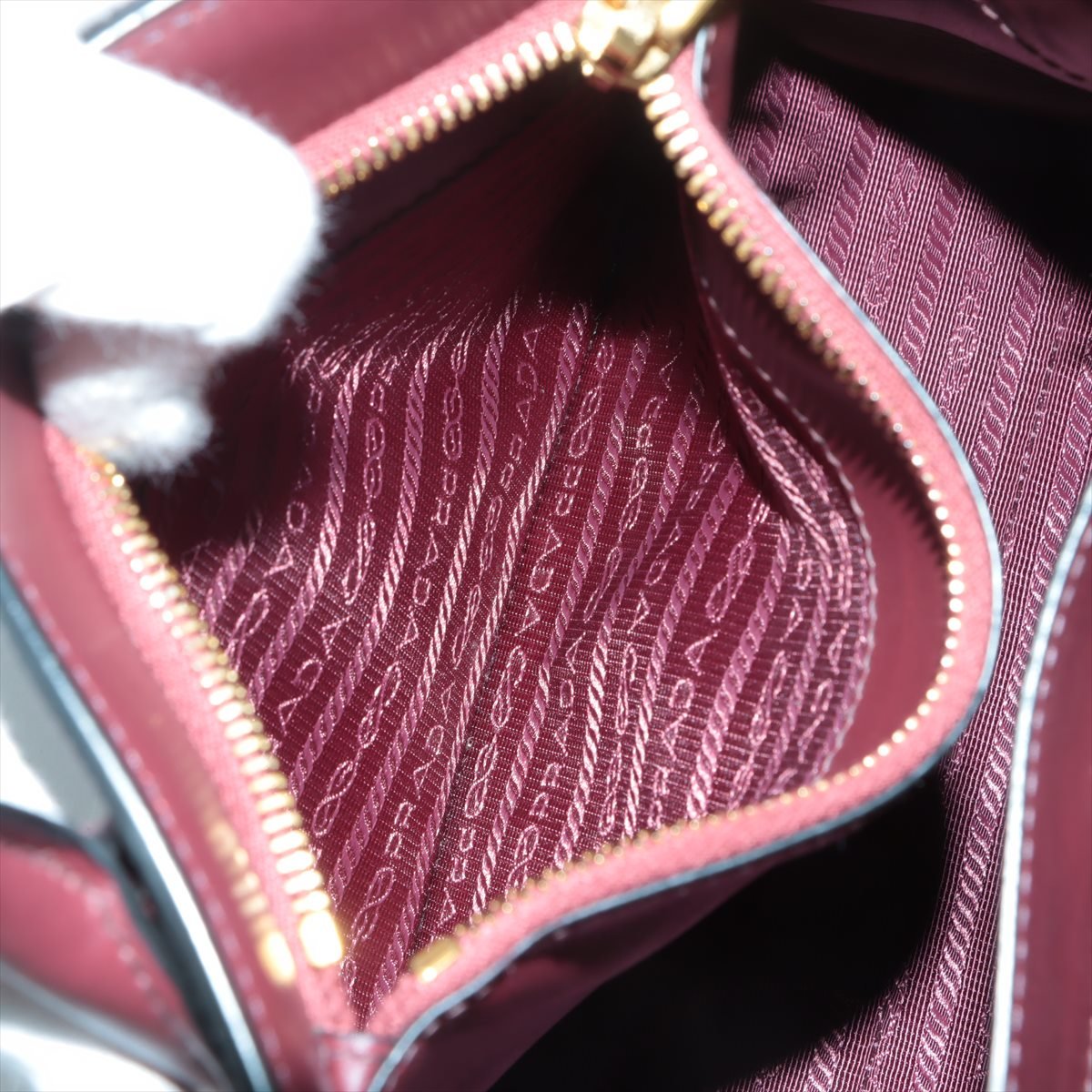 Second hand Prada Monochrome Small Saffiano Leather Burgundy Bag - Tabita Bags