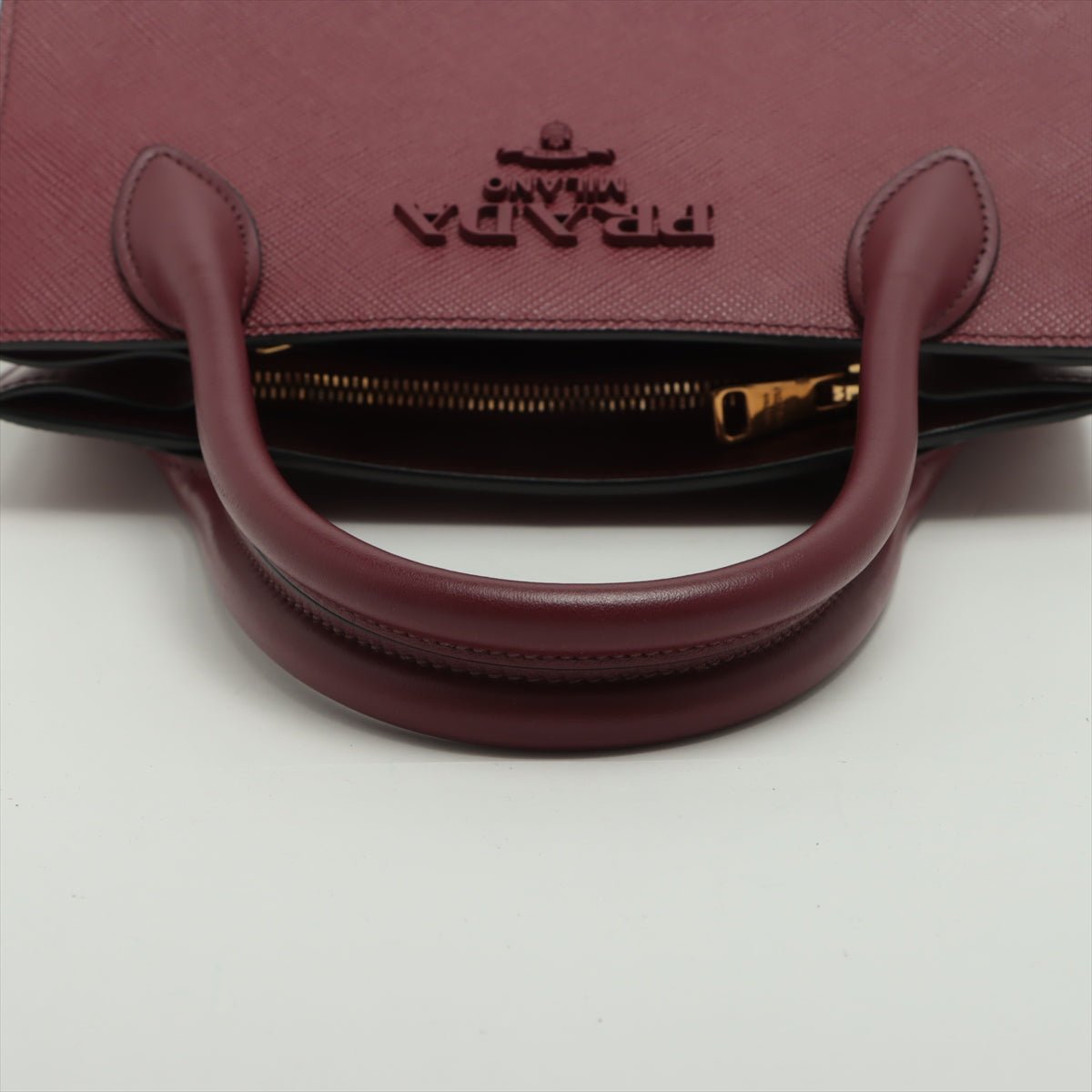 Second hand Prada Monochrome Small Saffiano Leather Burgundy Bag - Tabita Bags