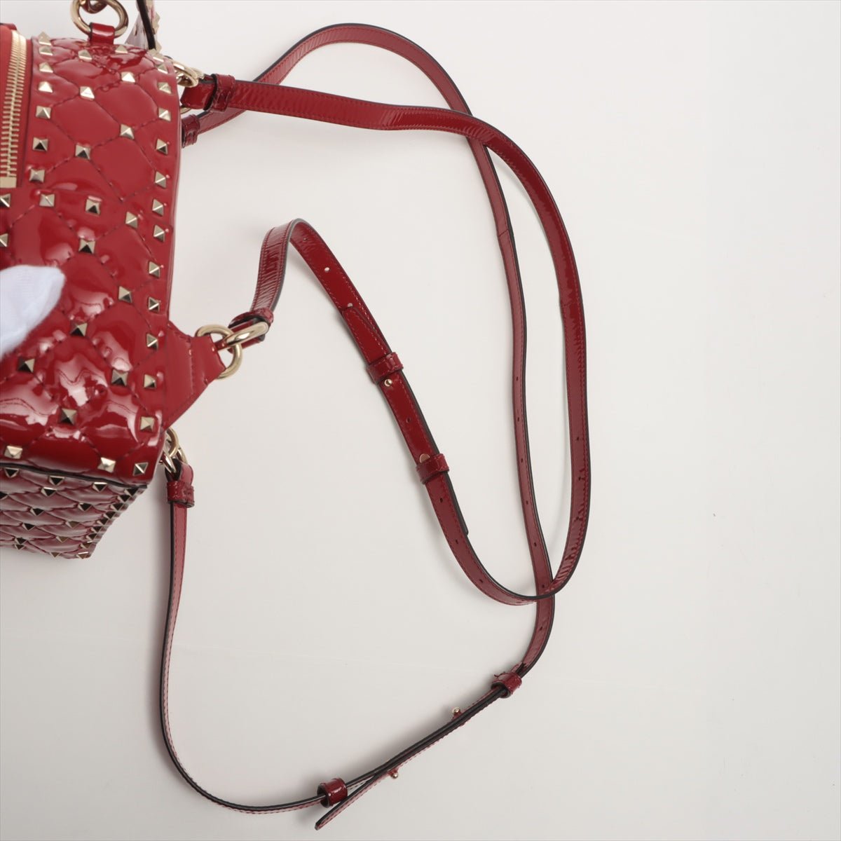 Second hand Valentino Garavani Rockstud Mini Backpack in Red Patent Leather - Tabita Bags